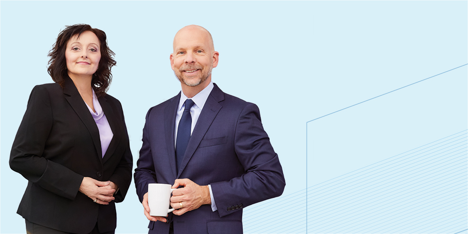 Two Baird associates professionally dressed.