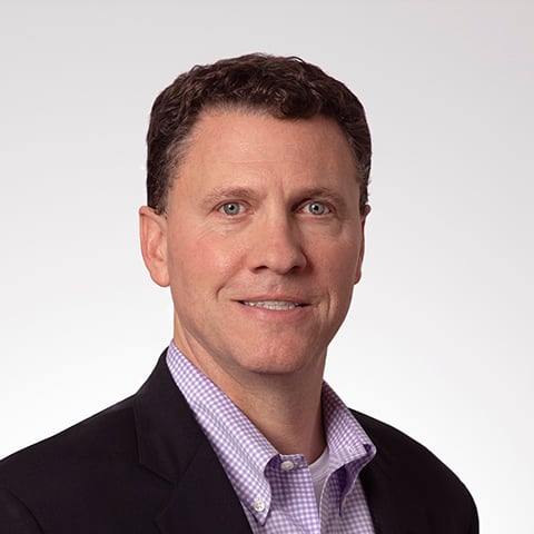 Professional headshot of Geoff Mackey.